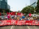 Thousands march through downtown Toronto during the Jobs, Justice & the Climate March on July 5th, 2015. The march was led by First Nations followed by frontline, impacted communities from across Toronto and beyond. The people were marching to call for action on climate change.
